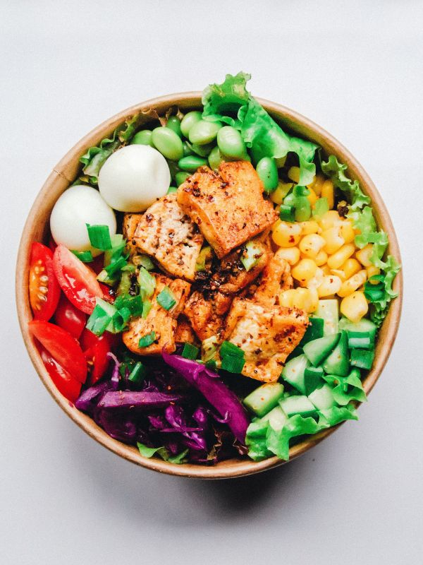 bowl of healthy food salad and protein